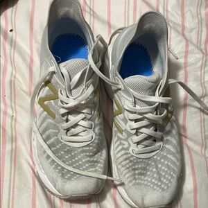 White and Gold Athletic Shoes